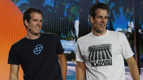 Tyler Winklevoss and Cameron Winklevoss (L-R), creators of crypto exchange at the Bitcoin 2021 Convention, Florida.