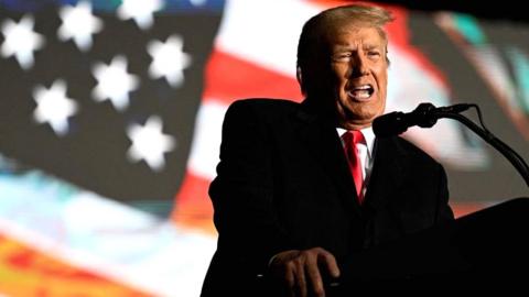 Former US President Donald Trump speaks at a rally to support Republican candidates ahead of midterm elections, in Dayton, Ohio, on 7 November 2022