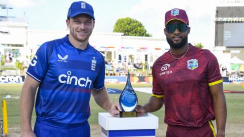 Jos Buttler and Shai Hope with the trophy for the one-day leg of the tour