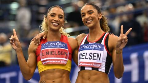 Laviai and Lina Nielsen of Great Britain celebrate following the women's 400m final at the UK Athletics Indoor Championships