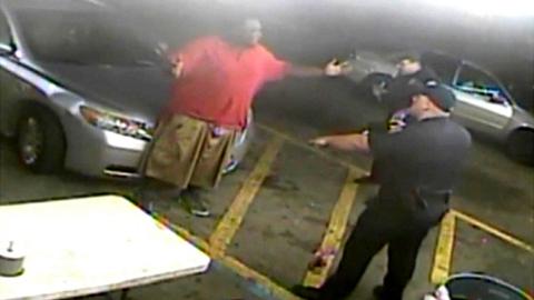Alton Sterling and two police officers