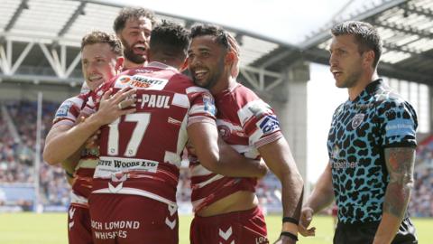Wigan celebrate Bevan French's try in the first-half