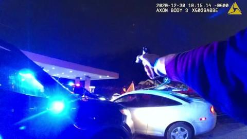 Police officer points gun in fatal shooting