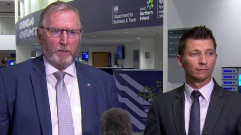 Ryan McCready, right, with party leader Doug Beattie at an investment conference last year