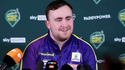 Luke Littler faces the media at a press conference