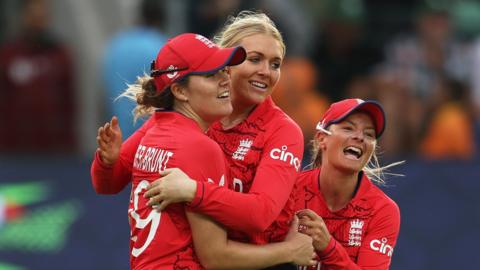England's Nat Sciver-Brunt, Sarah Glenn and Danni Wyatt celebrate a wicket v India