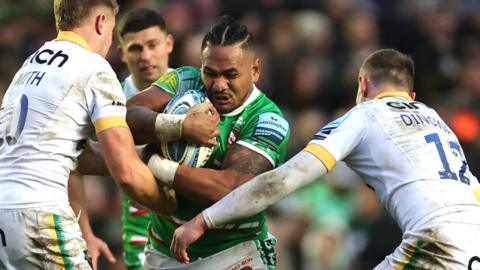 Solomone Kata of Leicester Tigers carries the ball into a tackle against Northampton