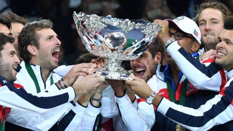 France players raise the Davis Cup in celebration after winning the 2017 title