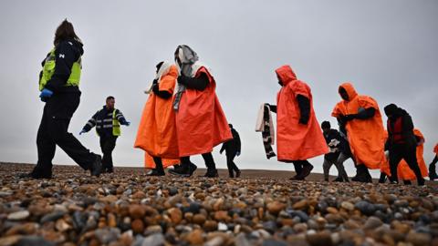 Asylum seekers who have been picked up by a lifeboat
