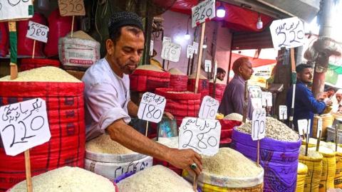 Shopkeepers at a wholesale market in Karachi, Pakistan.