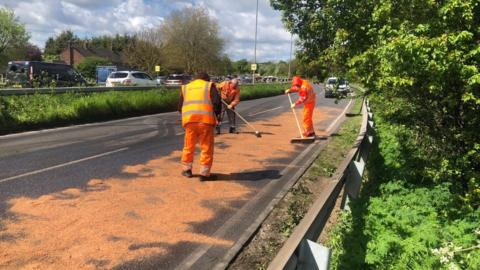 Council staff working on the closed road