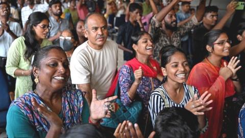 People celebrate the successful lunar landing of Chandrayaan-3 spacecraft on the south pole of the Moon, in Chennai on August 23, 2023