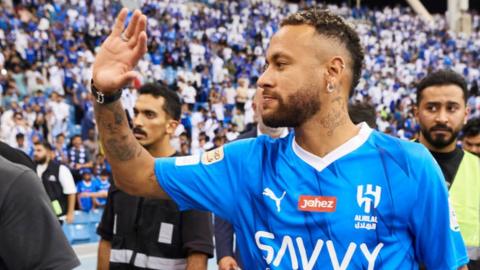 Neymar greets the crowd at Al Hilal after signing for the Saudi club