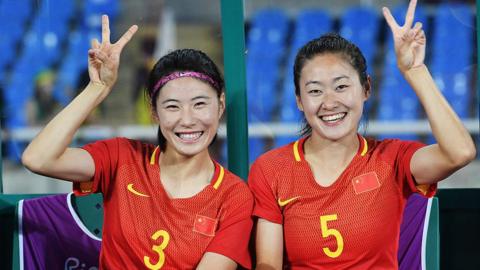 Xue Jiao and Wu Haiyan of China gesture during the Olympic Women's Football match between South Africa and China PR at Olympic Stadium on August 6, 2016 in Rio de Janeiro, Brazil.