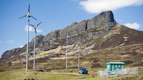 Wind turbines on the Isle of Eigg, Scotland, UK