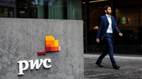 PwC sign and man walkign by 2018