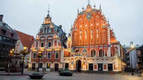 The empty square in front of House of the Blackheads is pictured during the first day of Emergency restrictions amid the coronavirus/Covid-19 pandemic leaving many services, such as spa, pubs, sport arenas closed and restaurants and cafes only allowed to offer food and drinks only for take away on November 9, 2020