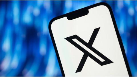 X logo on a phone