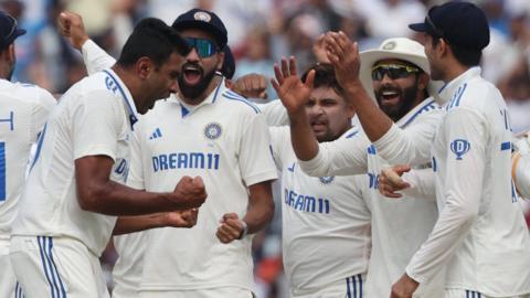 India celebrate a wicket