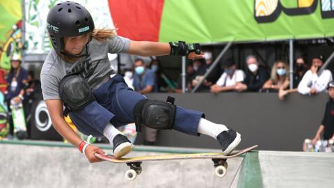 Skater Sky Brown performs a trick