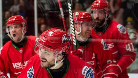 Cardiff Devils players celebrate a goal against Dundee Stars