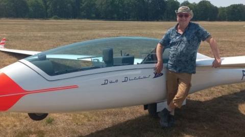 Bert Janssen pictured in front of a glider