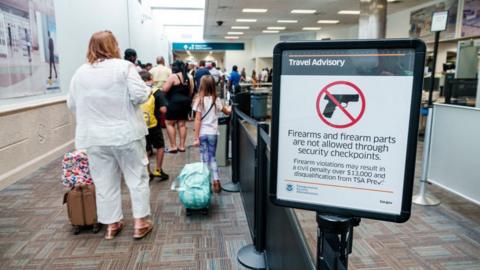 A no-gun sign at Fort Lauderdale-Hollywood Airport.