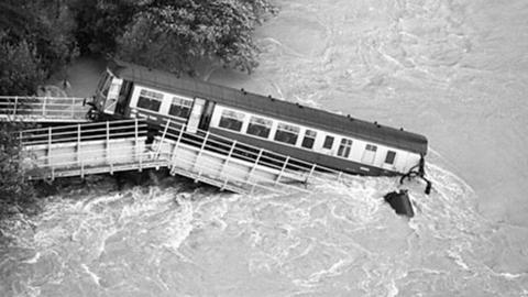 Image of train caught in extreme floods.