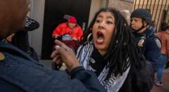 A woman shouting at a policeman