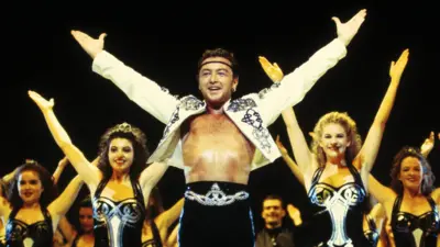 Michael Flatley with Lord of the Dance cast in 1996