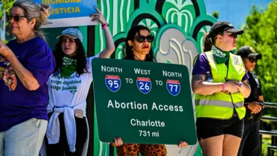 Pro-abortion rights activists participate in the "Rally for Our Freedom" to protect abortion rights for Floridians, in Orlando, Florida, on April 13, 2024.