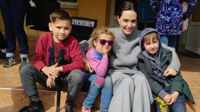 US actor and UNHCR Special Envoy Angelina Jolie poses for a picture with children, as Russia"s attack on Ukraine continues, in Lviv, Ukraine April 30, 2022