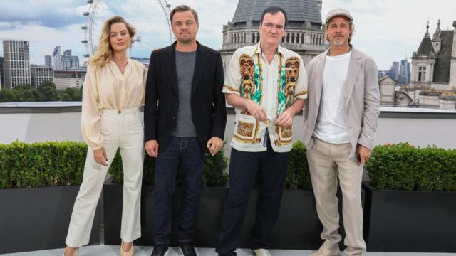 Главные лица картины: Марго Робби (Шэрон Тейт), Леонардо ди Каприо (Рик Далтон), Квентин Тарантино и Брэд Питт в день лондонской премьеры 31 июля 2019 г.