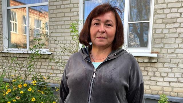 Inna stands close to her old school   