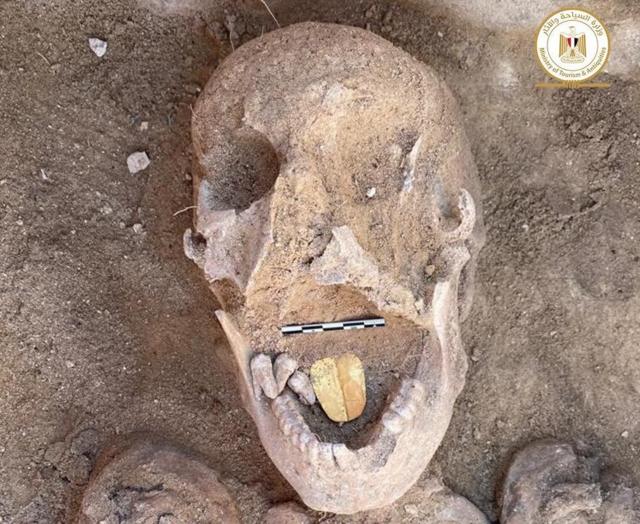 Remains of ancient Egyptian mummy with golden tongue placed inside its mouth, found at Alexandria's Taposiris Magna temple