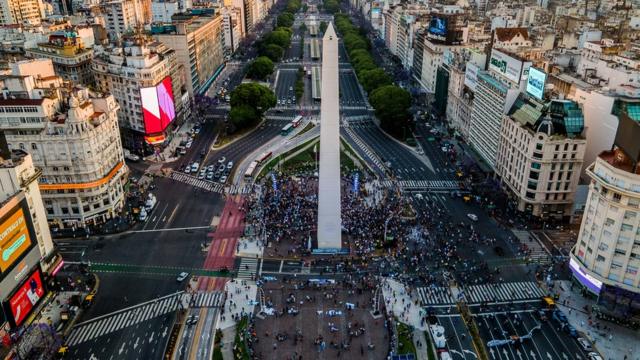 Fans gather around the Obelisk of Buenos Aires to cheer and pay tribute