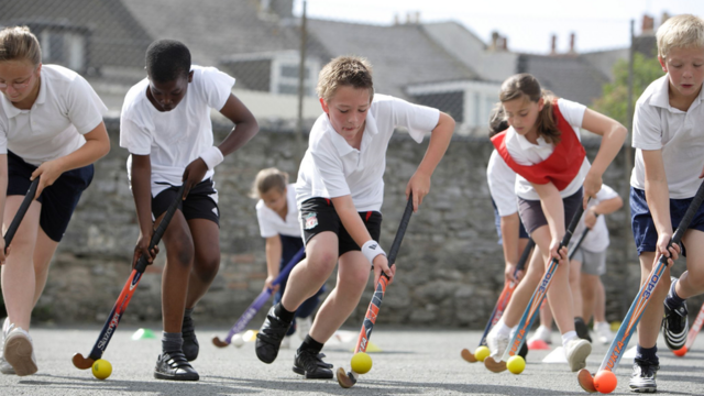 Kids playing hockey