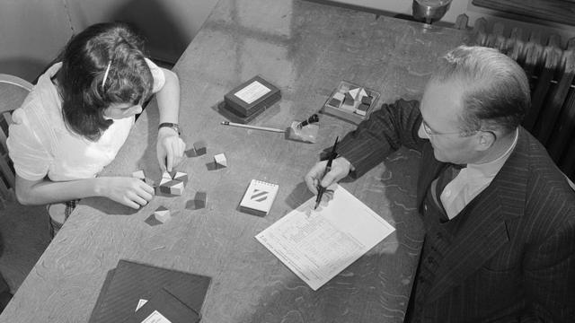 A young girl takes an IQ test in 1947