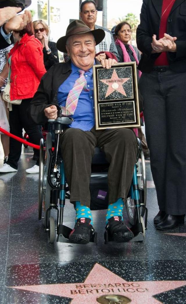 Бертолуччи на инаугурации памятной звезды в его честь на голливудской "Аллее славы" 19 ноября 2013 г.