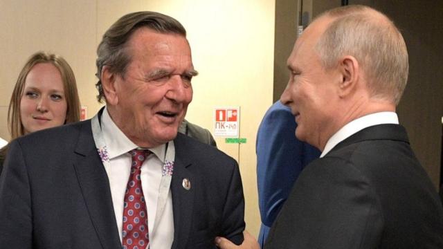 Gerhard Schroeder with Vladimir Putin at the opening of the Fifa World Cup in 2018