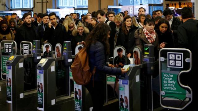 Queues at the ticket barriers at Clapham Junction