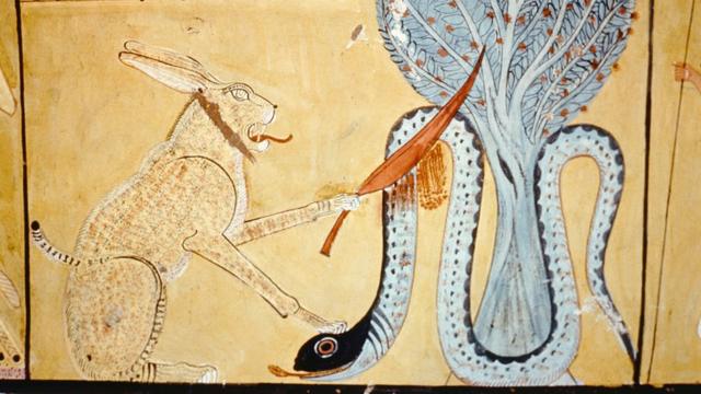Бог Ра в образе кота побеждает Апофиса в образе змея