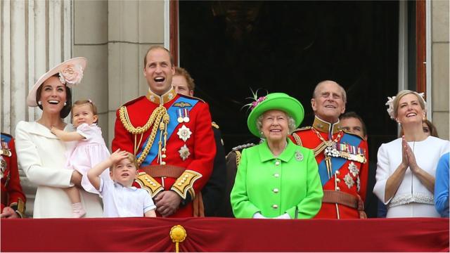 Queen Elizabeth II joins members of the royal family, including the Duke and Duchess of Cambridge with their children Princess Charlotte and Prince George, on the balcony of Buckingham Palace, central London after they attended the Trooping the Colour ceremony as the Queen celebrates her official birthday today