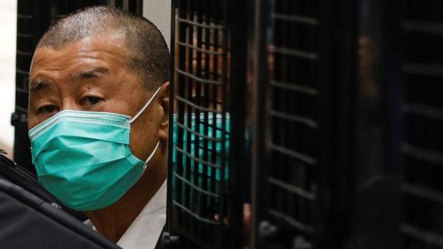 Джимми Лай после доставки в суд 9 февраля