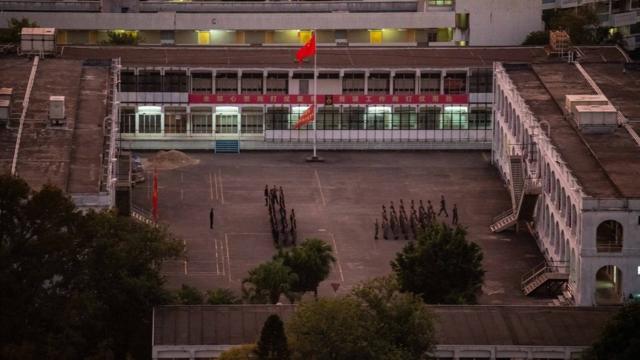 Chinese soldiers conducting drills in the PLA barracks in Hong Kong