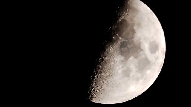 MADDALONI, CASERTA, ITALY - 2022/12/30: First quarter moon of December last of 2022, seen from southern Italy. (Photo by Vincenzo Izzo/LightRocket via Getty Images)