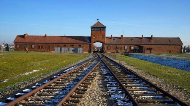 The railway tracks entering the main building at the Auschwitz-Birkenau German Nazi death camp.