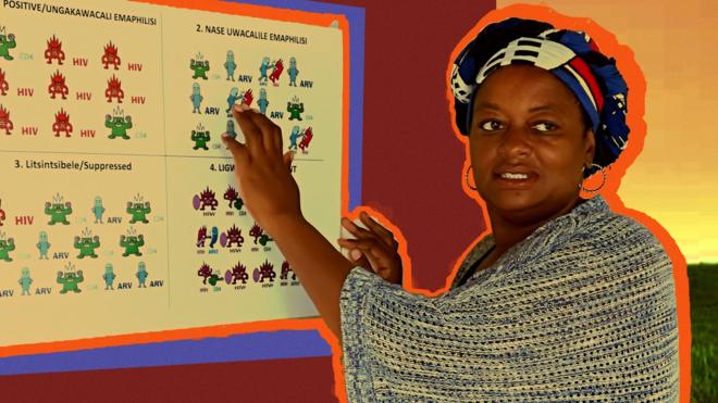 Thembi standing by a board with HIV symbols