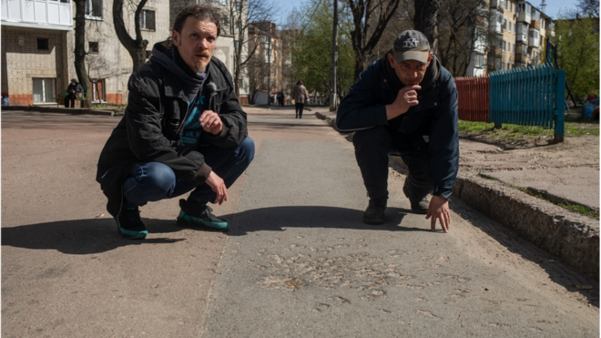 Oleksandr Drachko (left), a teacher, and Vitalii Hmyrianskyi (right), who works in advertising were eyewitnesses to the bread queue cluster munitions attack