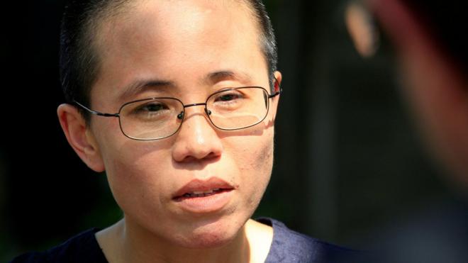 Liu Xia, wife of veteran Chinese pro-democracy activist Liu Xiaobo, listens to a question during an interview in Beijing, China June 24, 2009.